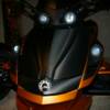 The carbon fiber decal package on a Spyder RS hood
